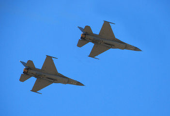 Fototapeta na wymiar two f-16 jet fighters