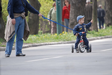 baby on bike in park