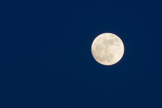 moon in dark blue sky