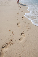 footprints on sand.