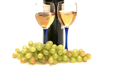 two wine glasses and cluster of grapes