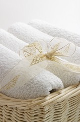towels in the basket with ribbon
