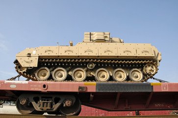 Fototapeta na wymiar military tank on railcar