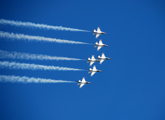 team of fighter jets flying in formation - 3312935