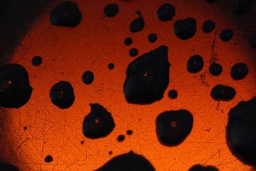 water droplets and light on the car surface