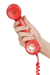 hand holding red telephone