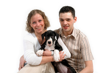 young couple and puppy