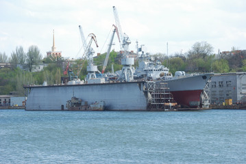 military ship in dry dock