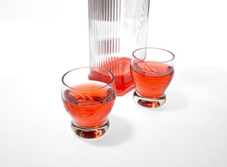 Bottle with alcohol and wine-glasses