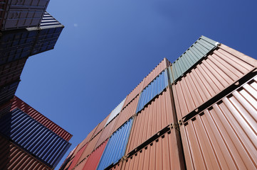 freight containers against blue sky