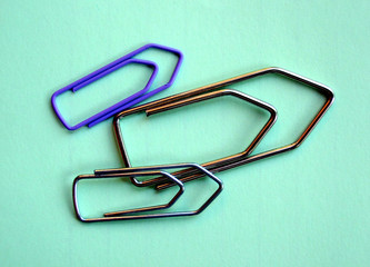 clipped yellow paper on lined paper background