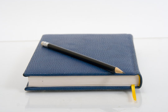 Dark Blue Notebook On A Table. Close Up.