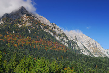 mountain profiled on blue sky