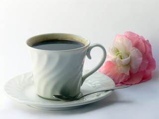 coffe and a pink flower
