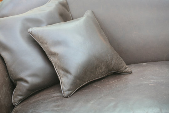 two leather pillows
