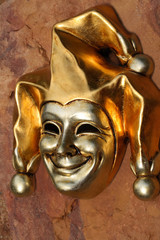 venetian mask of smiling joker