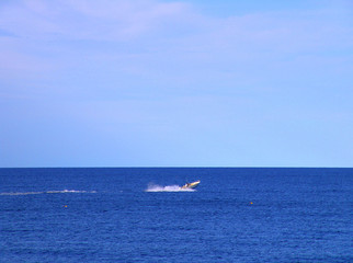 blue sky ocean sea speed boat
