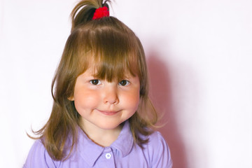 little girl is smiling