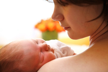 happy mother with newborn baby