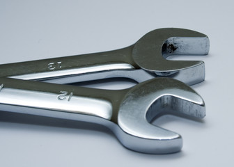 two open ended spanners or wrenches