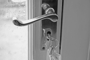 door handle, key and lock
