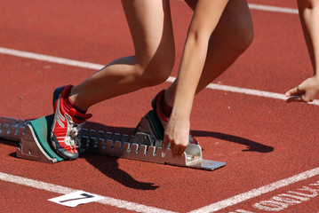 runner running on the track in the stadium
