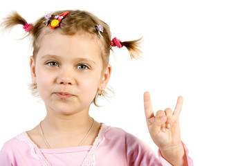 little girl showing fingers sign