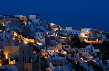the village of oia at dusk