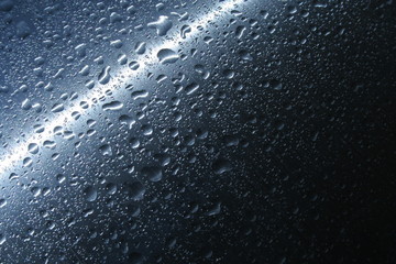 water drops on a metal structure