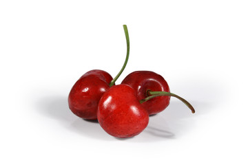 three juicy cherries