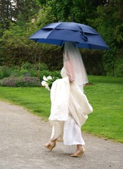 brides with umbrella