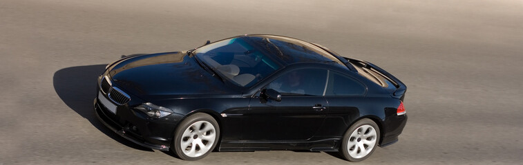 ultra luxury sport car ride speed on road isolated