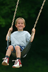 boy swinging