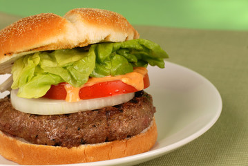 hamburger with a red pepper aioli sauce