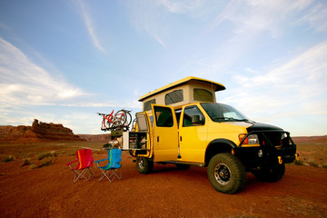 camping with yellow rv van