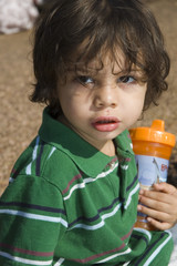 young boy looking back