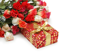 roses and gift box isolated on white