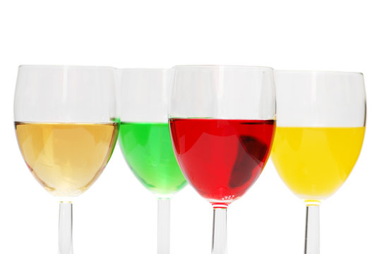 cocktails of various colors isolated on white