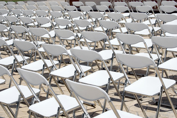 array of white chairs