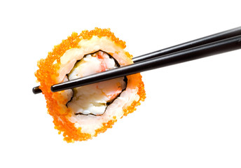 sushi with chopsticks shot on white