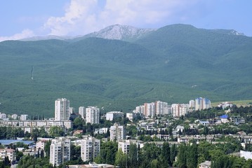 modern city located in an environment of mountains