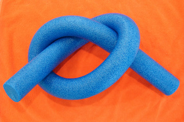 blue noodle on orange