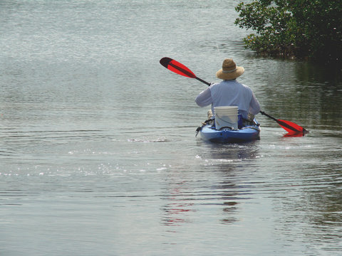 rowing a kayak