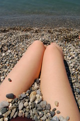 legs aimed at the sea