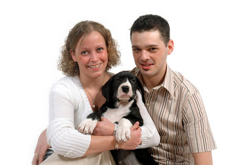 young couple and puppy