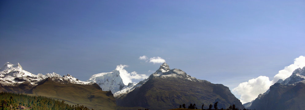 blue sky and mountain peaks