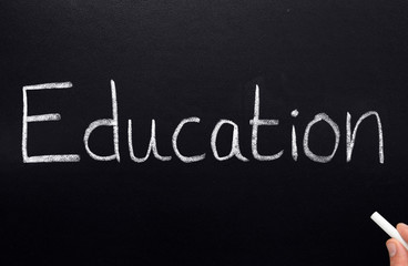 Education, written on a blackboard.