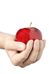 hand holding a red apple