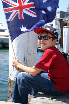 boy on harbourside pier