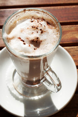 closeup of cafe latte in long glass cup